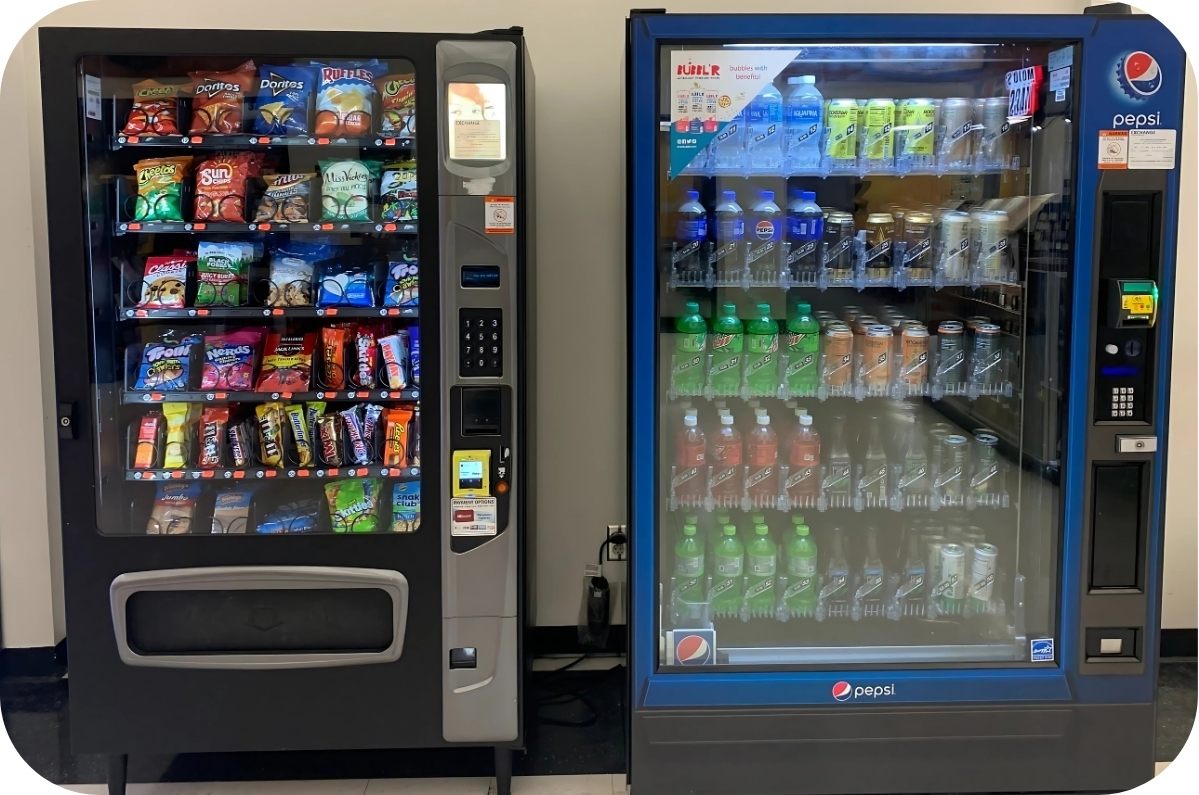 A VendiSphere snack machine and drink machine installed side by side